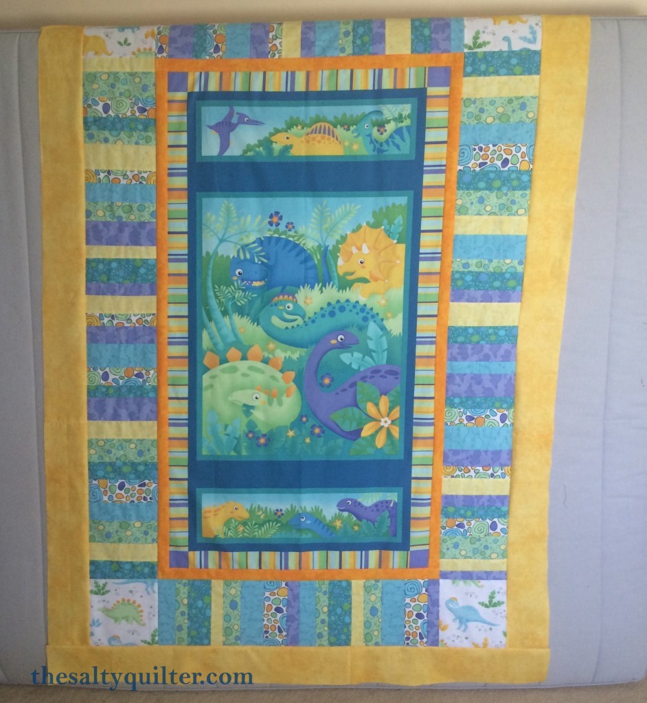 The Salty Quilter - In Defence of Panels - Dino panel quilt top